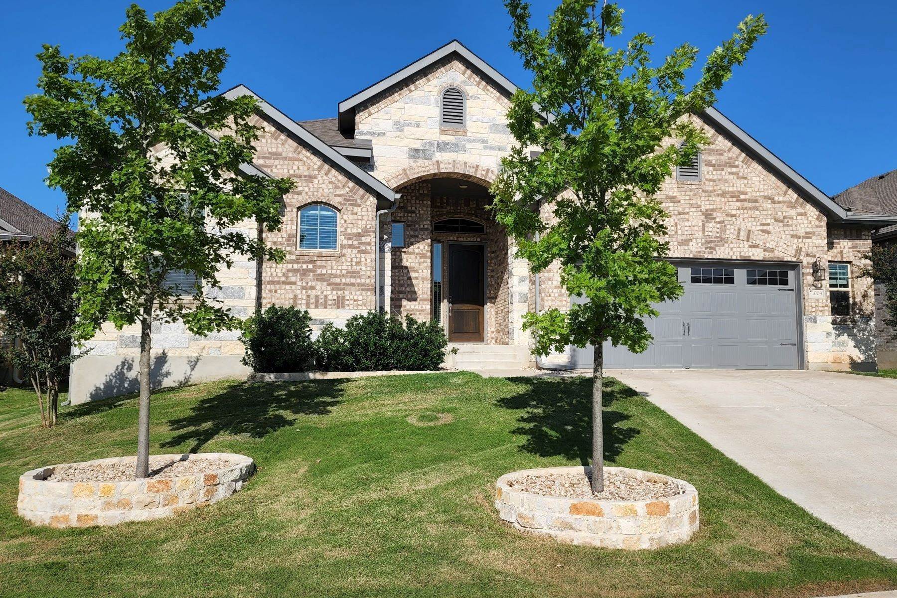 Single Family Homes for Sale at Like-New Thoughtfully Designed Home Ensures That Every Room is Spacious 1009 Partida Trail Leander, Texas 78641 United States